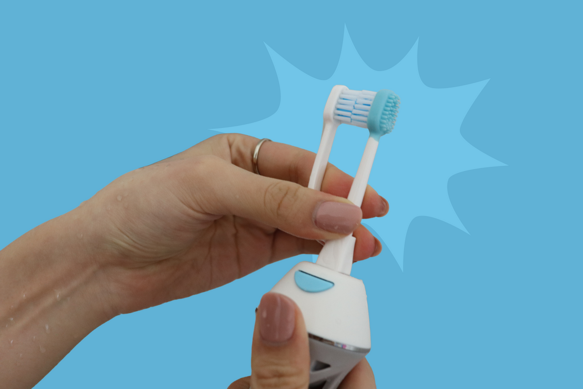 Dual headed water flossing toothbrush works only with ToothShower,  attaches and removes easily from the ToothShower open air handle.